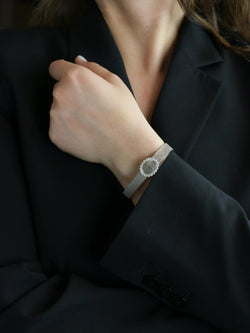 ANDRE COL Montre à secret or blanc diamants - Castafiore