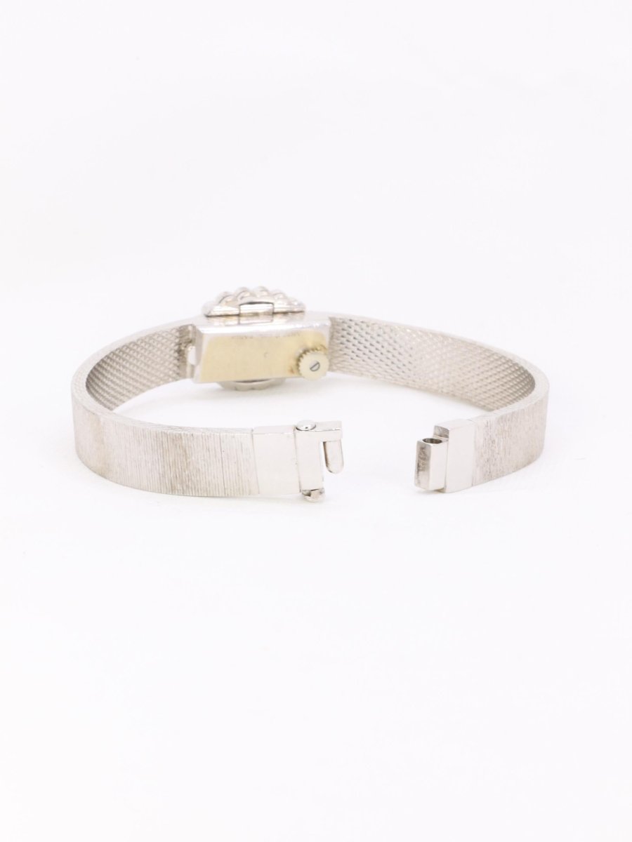 ANDRE COL Montre à secret or blanc diamants - Castafiore