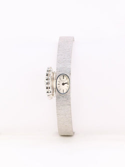 ANDRE COL Montre à secret or blanc diamants - Castafiore