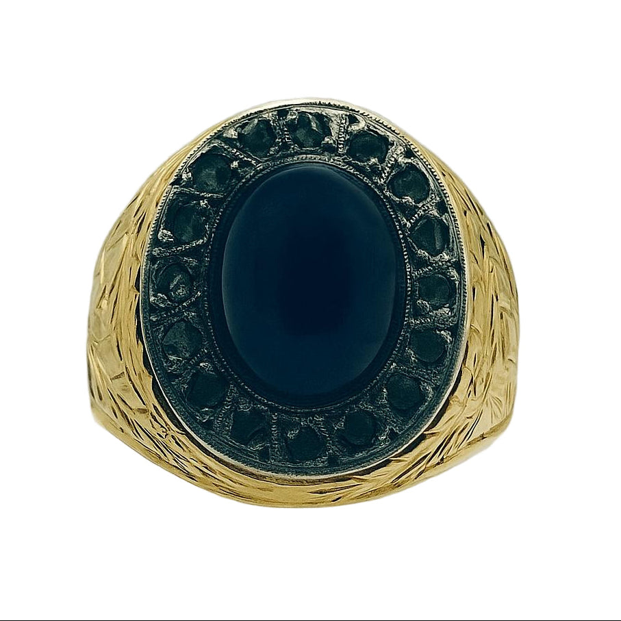 ANILLO EN ORO AMARILLO Y PLATINO, CON CABUJÓN DE ZAFIRO AZUL Y DIAMANTES ANTIGUOS - Castafiore