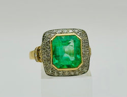 ANILLO EN ORO AMARILLO Y PLATINO CON UNA ESMERALDA Y DIAMANTES - Castafiore