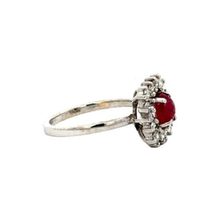 Bague Entourage en or blanc, rubis et diamants