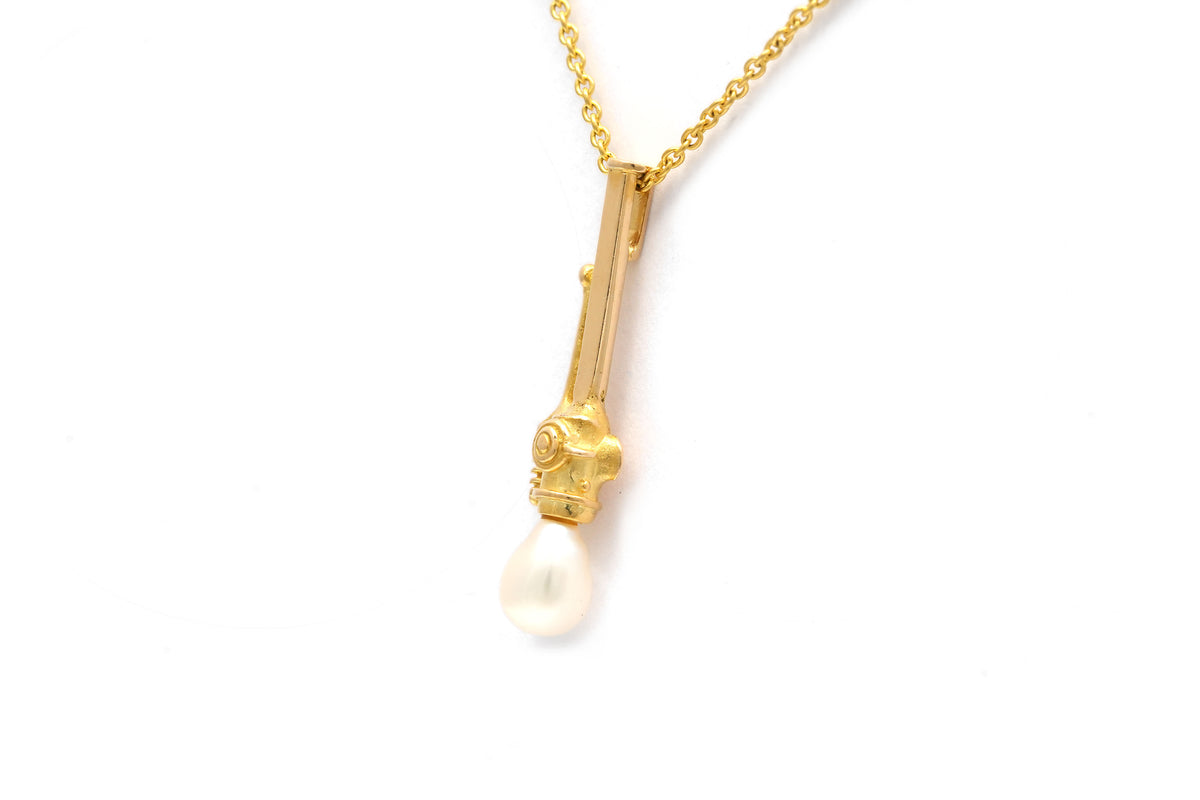 Pendentif en or jaune et perle
