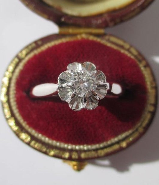 Bague Solitaire en or blanc, platine, et diamant