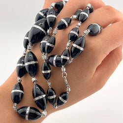 Collier R.CAMPELL en platine, onyx et diamants