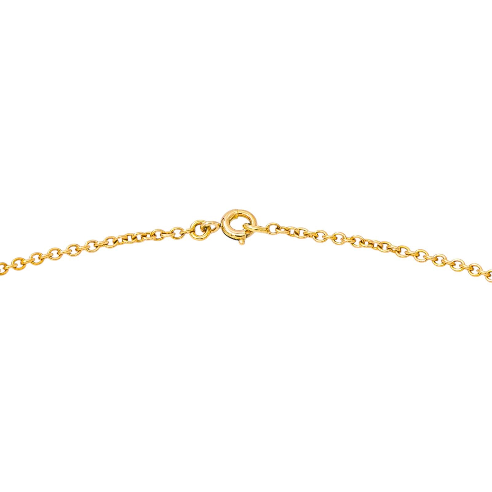 Collier Pendentif VAN CLEEF & ARPELS "Noeud" en or jaune, corail et diamants