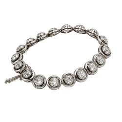 Bracelet en or blanc, argent et diamants