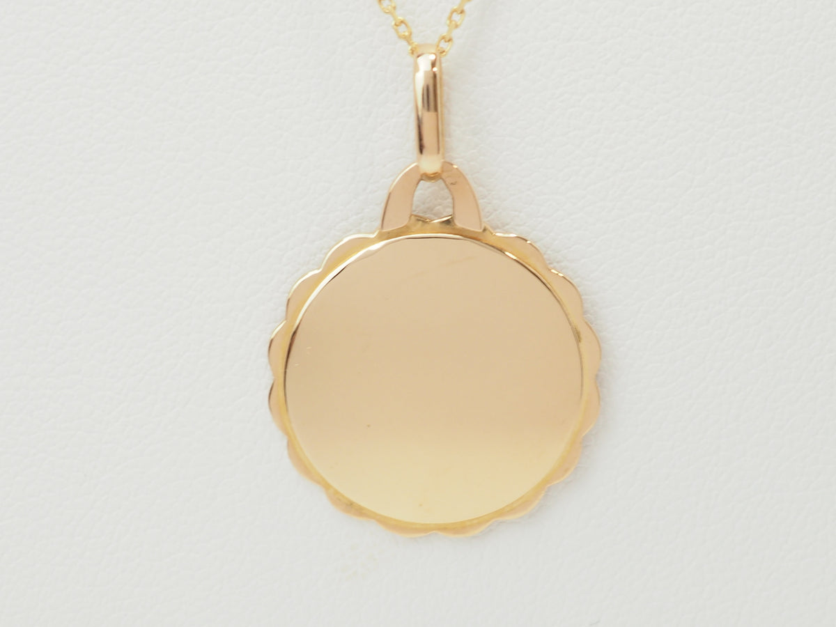 Pendentif AUGIS Plus qu'hier, moins que demain en or jaune et rubis