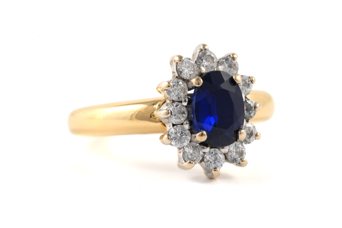 Bague Marguerite en or jaune, saphir et zirconiums