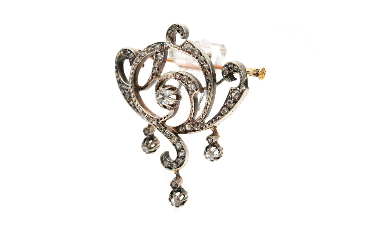 Broche Épingle en or jaune, argent et diamants