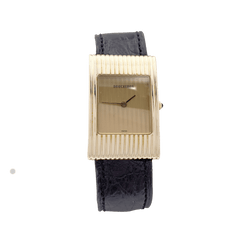 Montre Boucheron, "Reflet", or jaune, cuir.