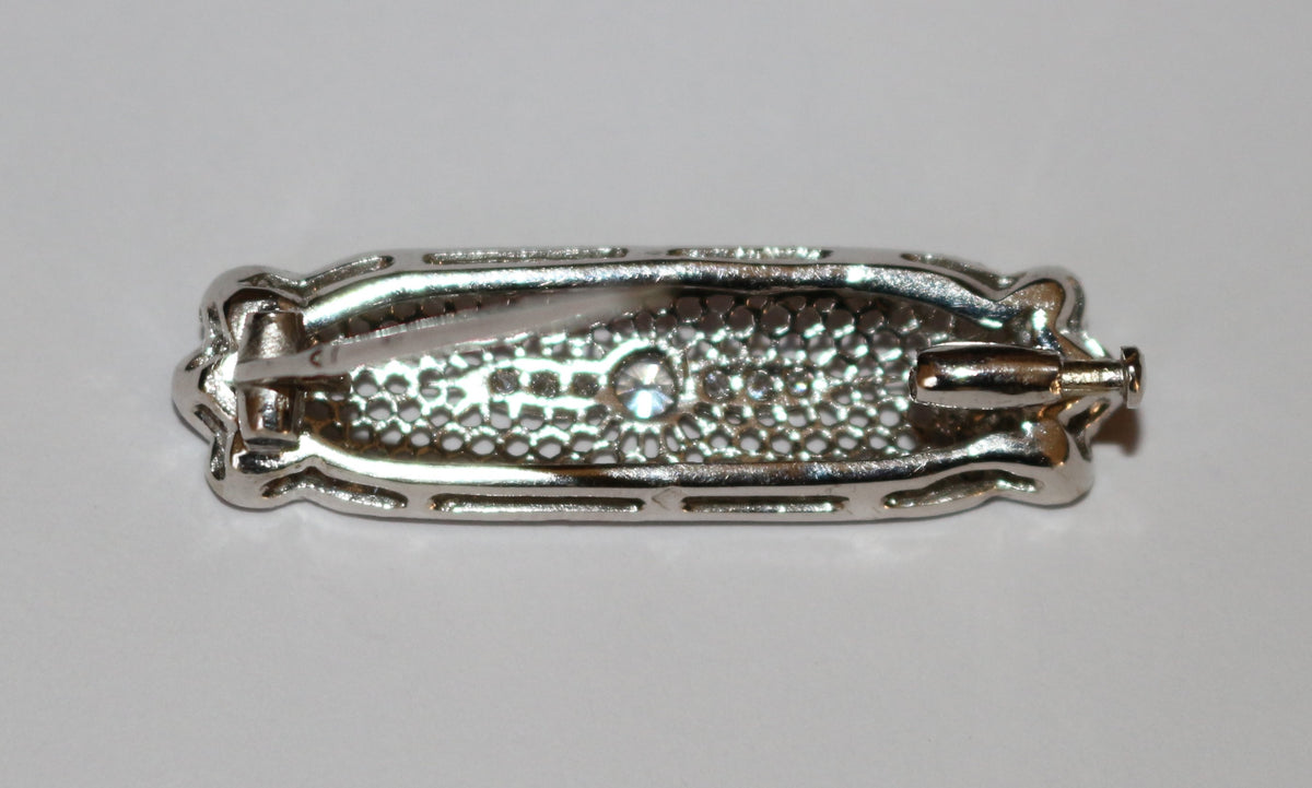 Broche-barrette de style Art Déco en or blanc et diamants