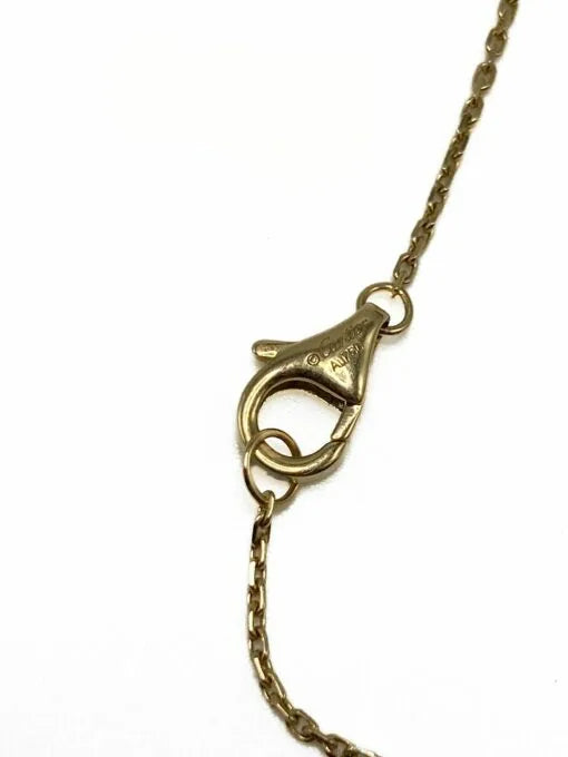 Collier Pendentif CARTIER "Amulette" en or blanc, nacre et diamant