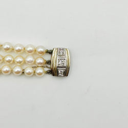Collier de Perles trois rangs en perle de culture, or blanc et diamants