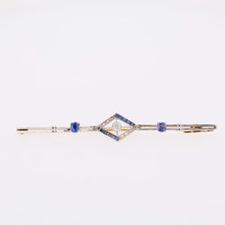 Broche Barrette en or jaune, platine, saphirs et diamants