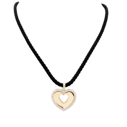 Pendentif Poiray "Coeur Secret" en deux tons d'ors et diamants.