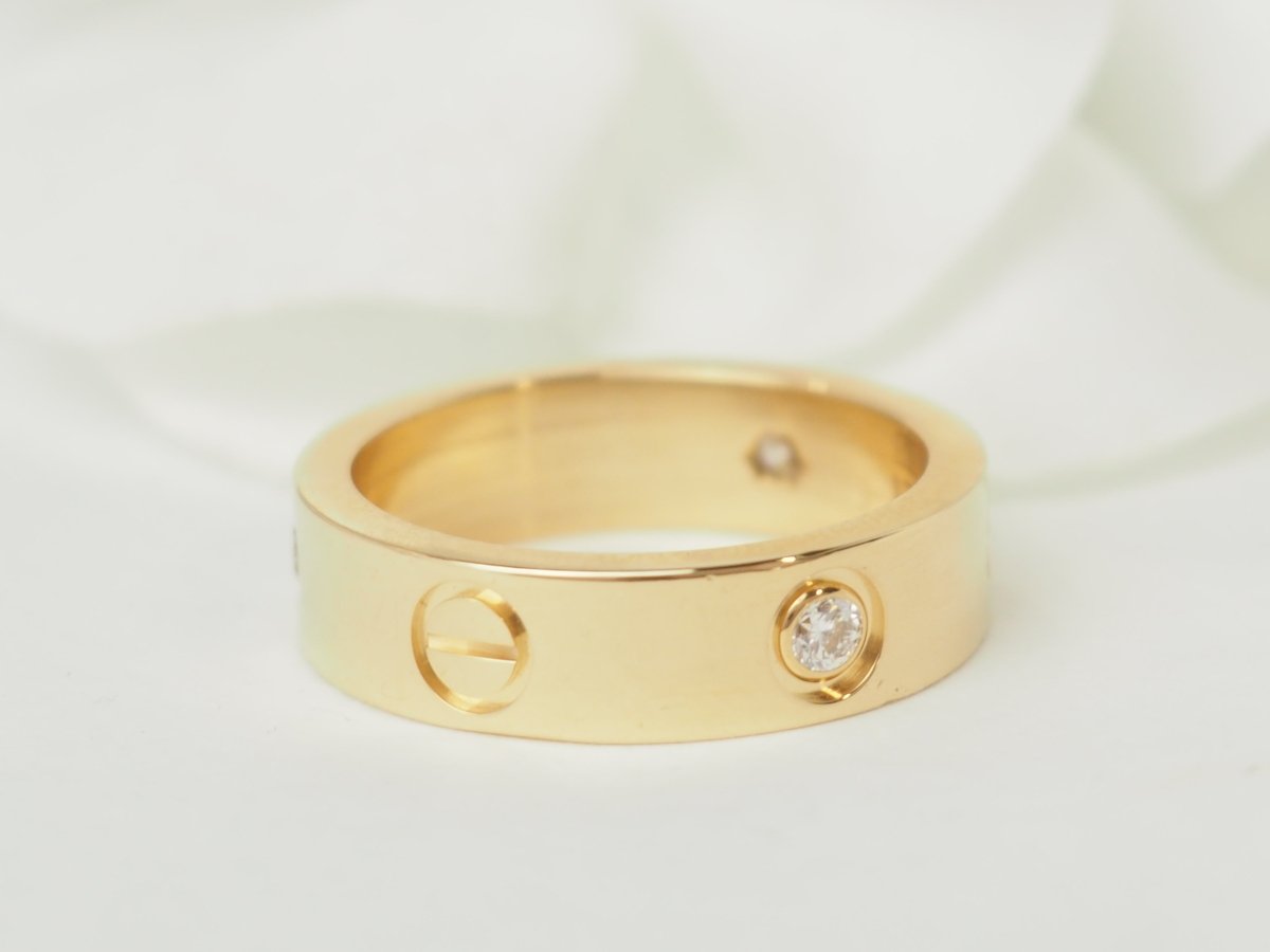 Bague Alliance CARTIER "Love" en or jaune et diamants - Castafiore