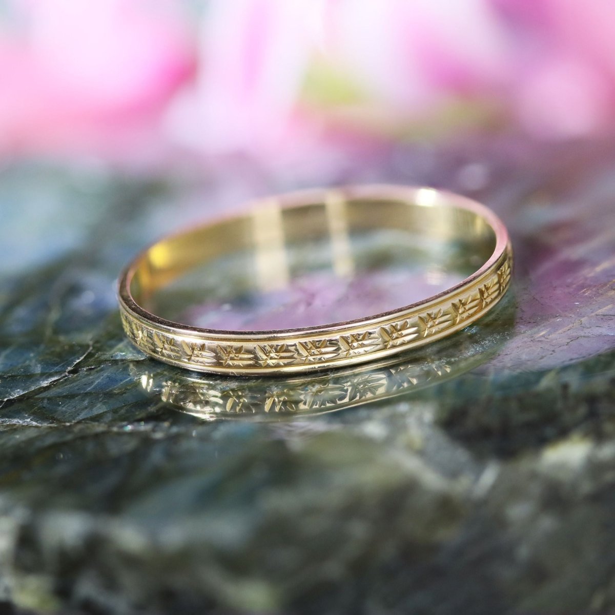 Bague alliance fine ciselée en or rose - Castafiore