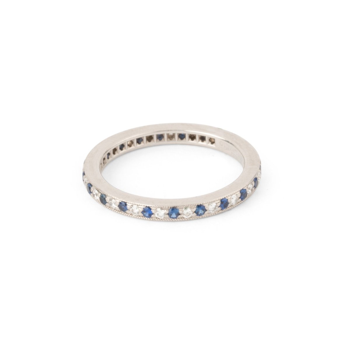 Bague Alliance TIFFANY & CO en platine, saphirs et diamants - Castafiore