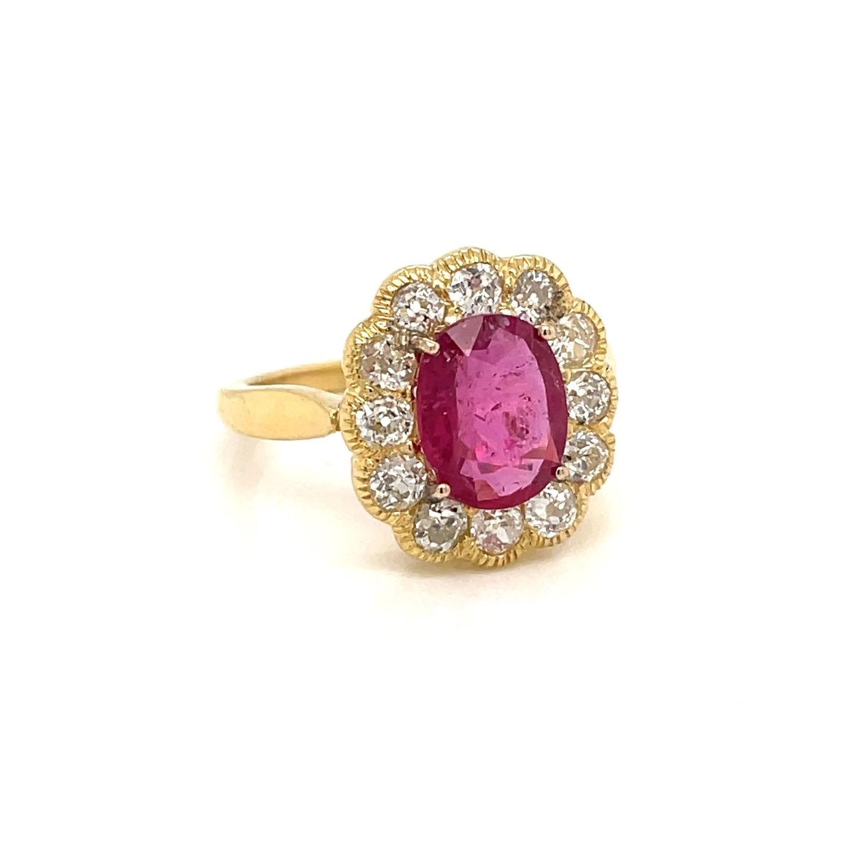 Bague ancienne en or rose, rubis et diamants - Castafiore