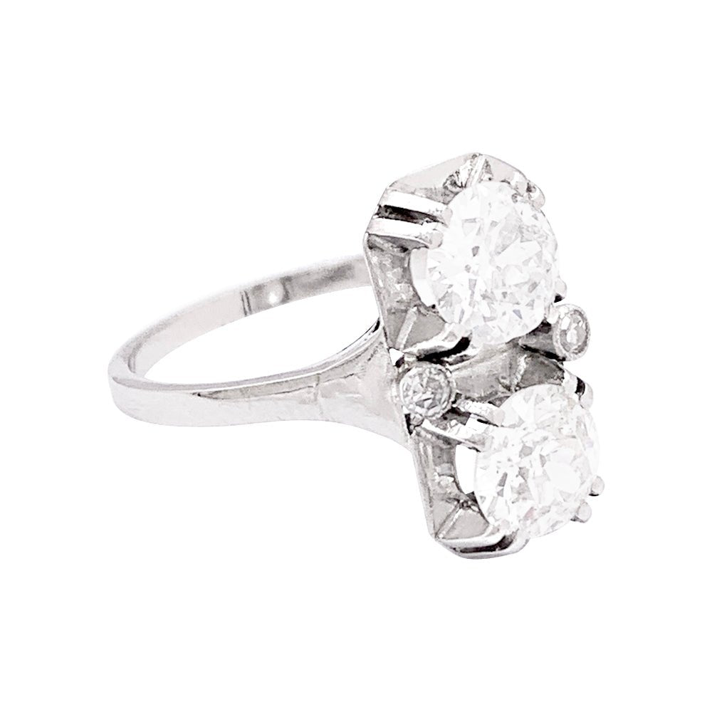 Bague ancienne "Toi & Moi", platine, diamants. - Castafiore