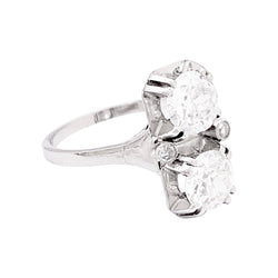 Bague ancienne "Toi & Moi", platine, diamants. - Castafiore