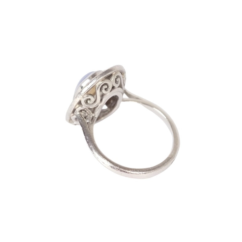 Bague Art Deco en platine, opale et diamants - Castafiore