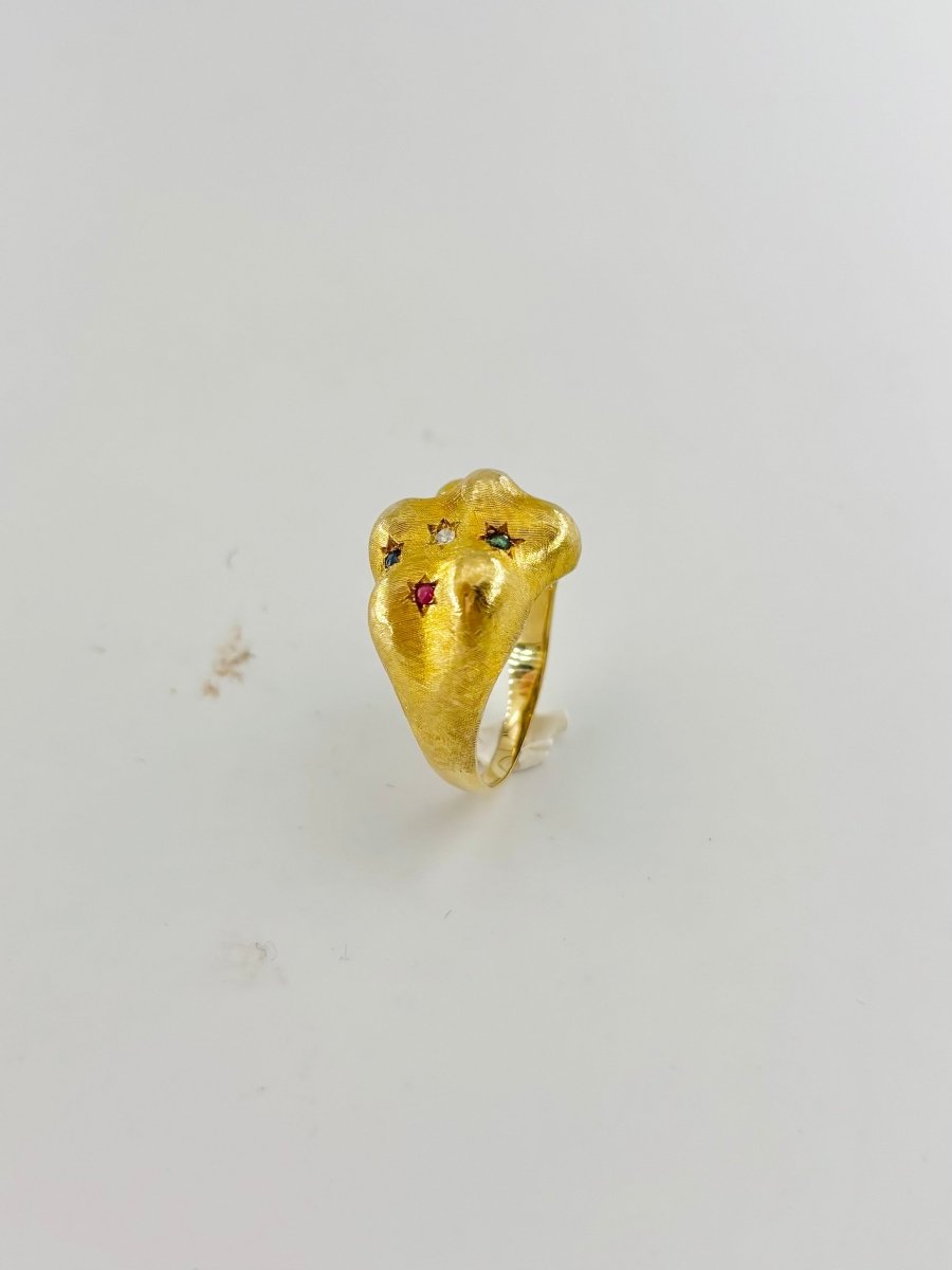 Bague Bandeau en or jaune, émeraudes, rubis, saphirs et diamant - Castafiore
