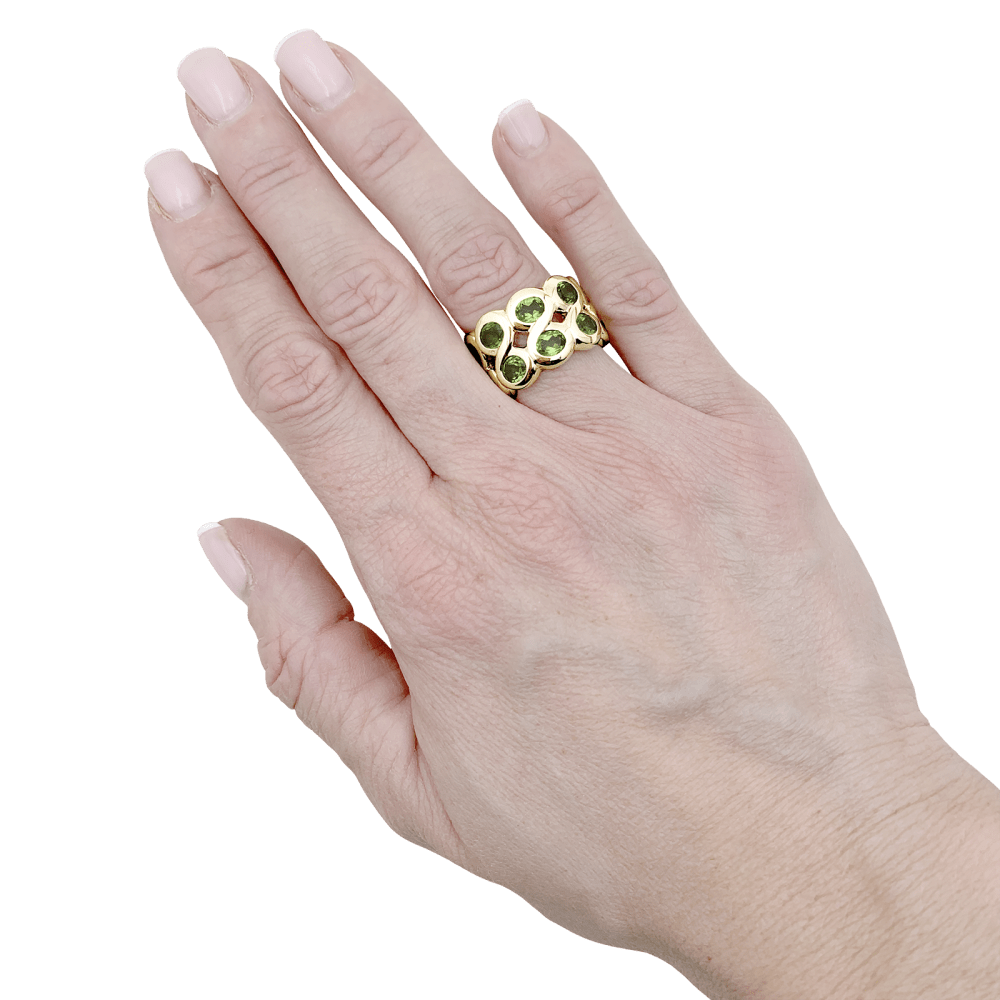 Bague Bandeau en or jaune et péridots - Castafiore