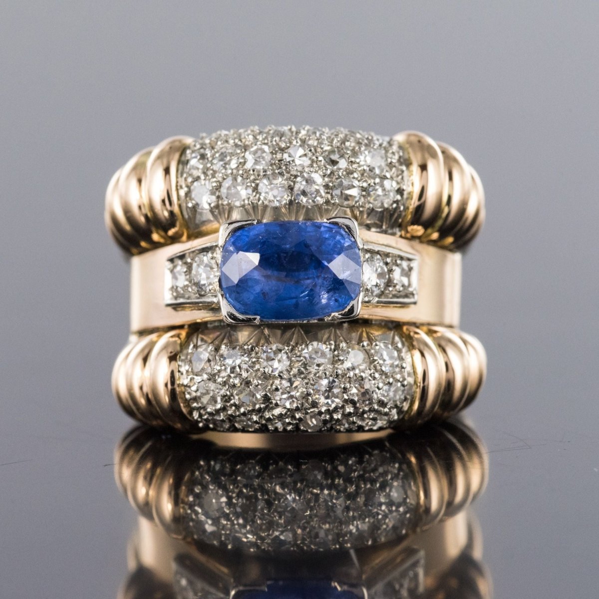 Bague Bandeau en or jaune et platine, saphir et diamants - Castafiore