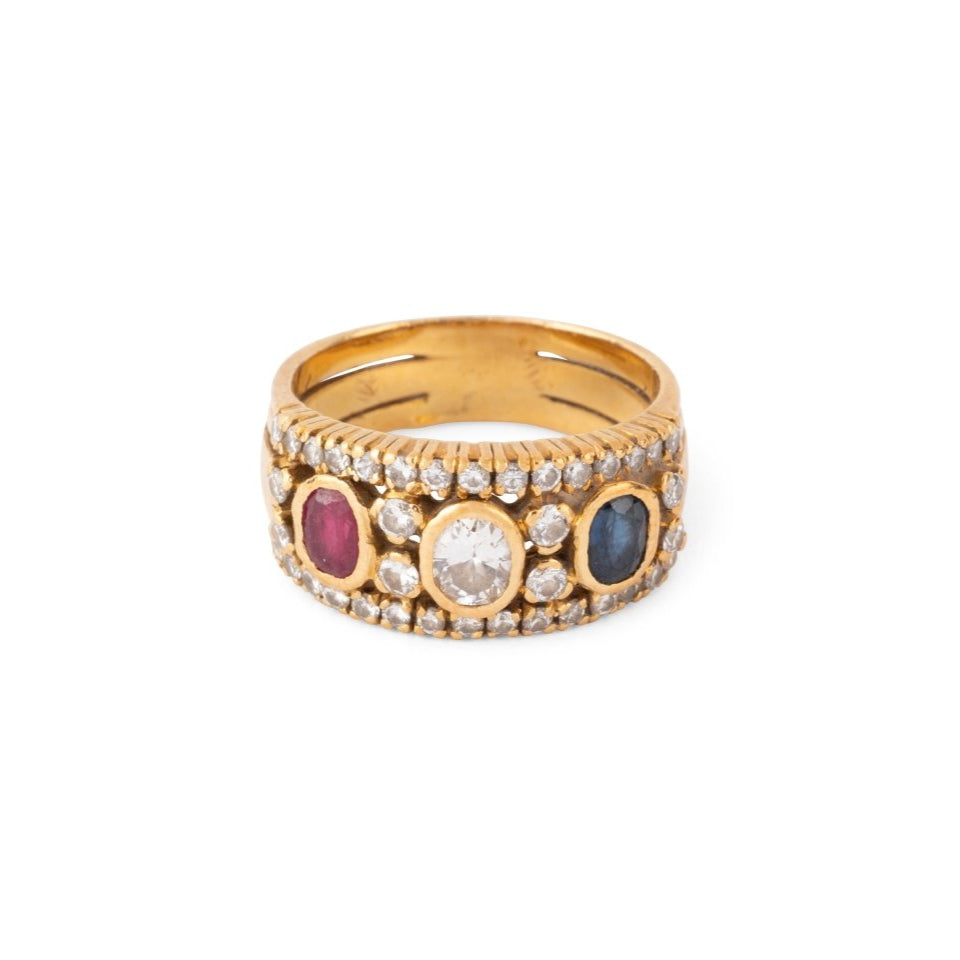 Bague Bandeau en or jaune, rubis, saphir et diamants - Castafiore