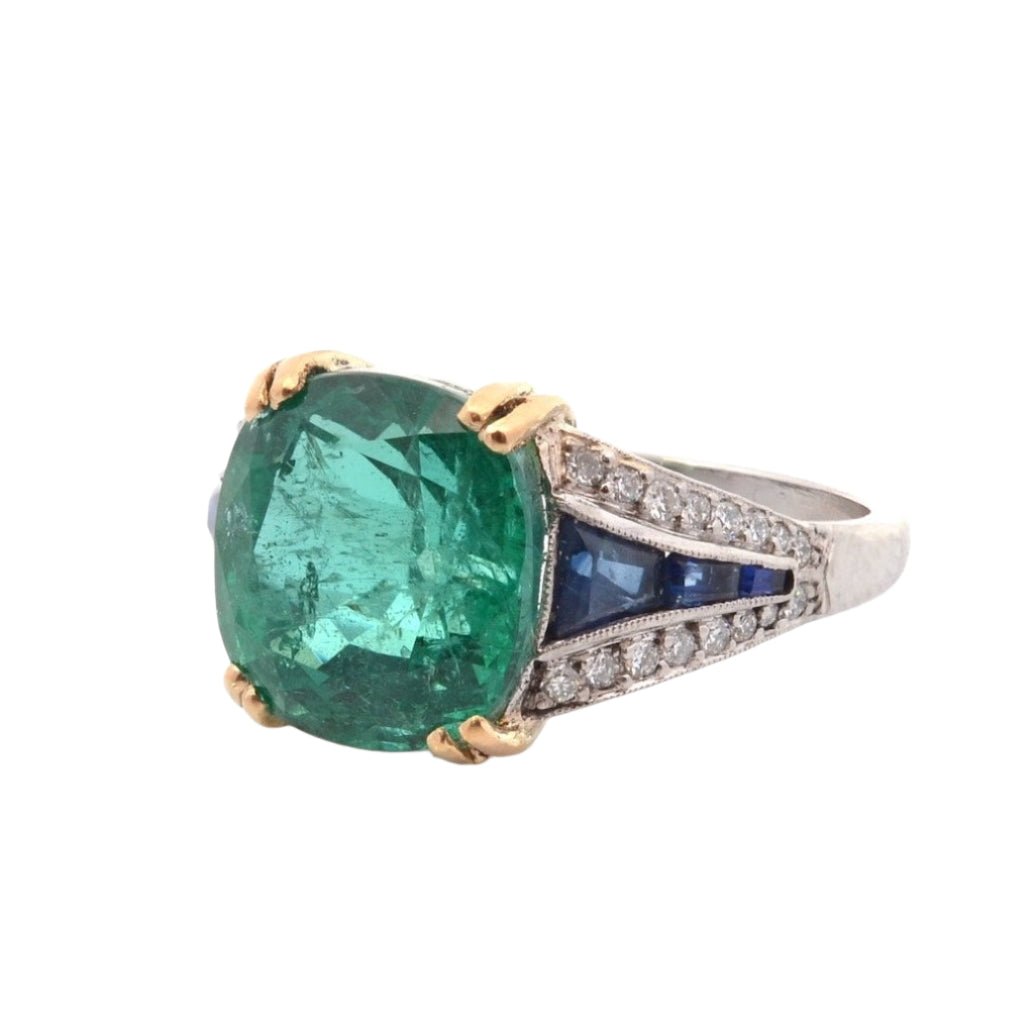 Bague Bandeau en platine et or jaune, émeraude, saphirs et diamants - Castafiore