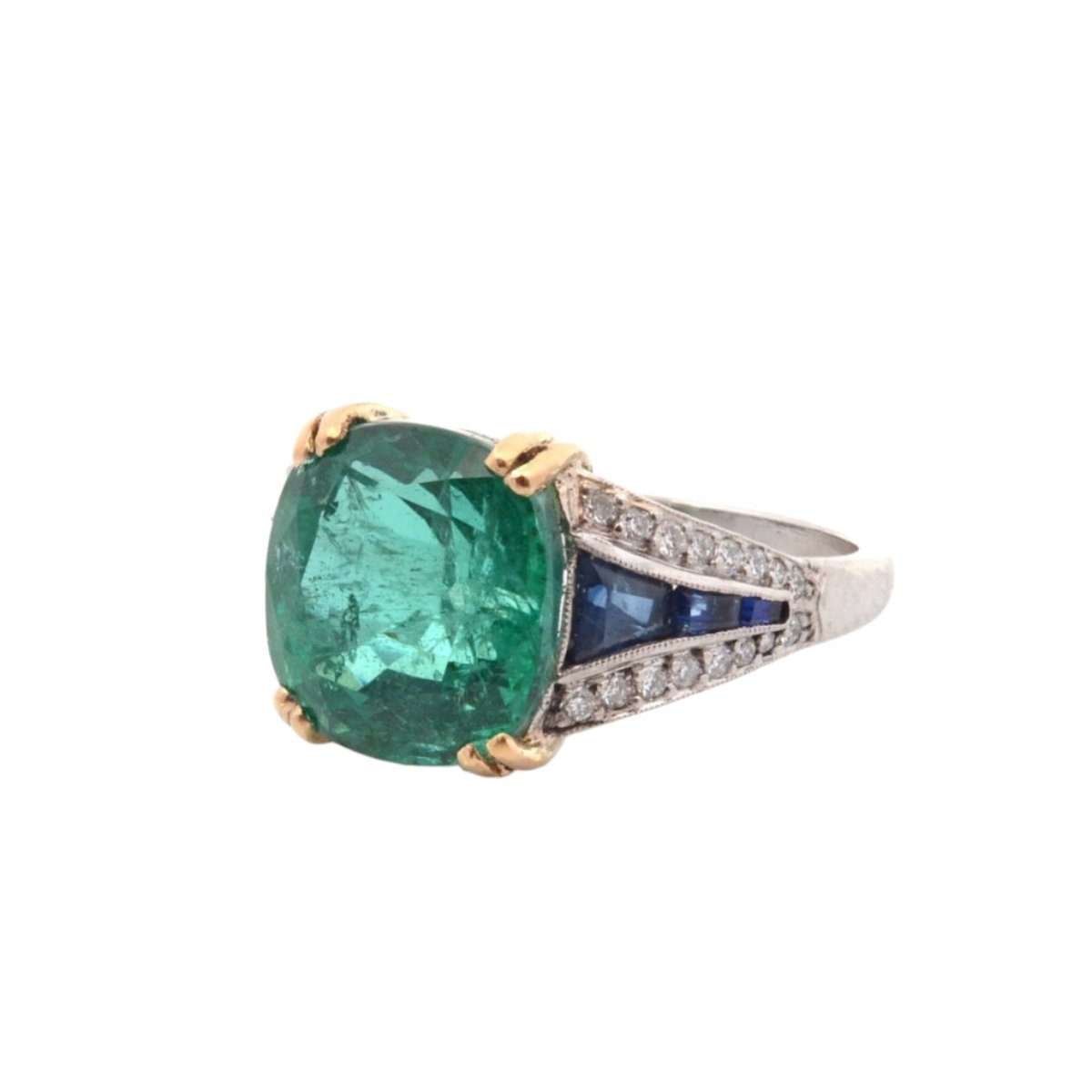 Bague Bandeau en platine et or jaune, émeraude, saphirs et diamants - Castafiore