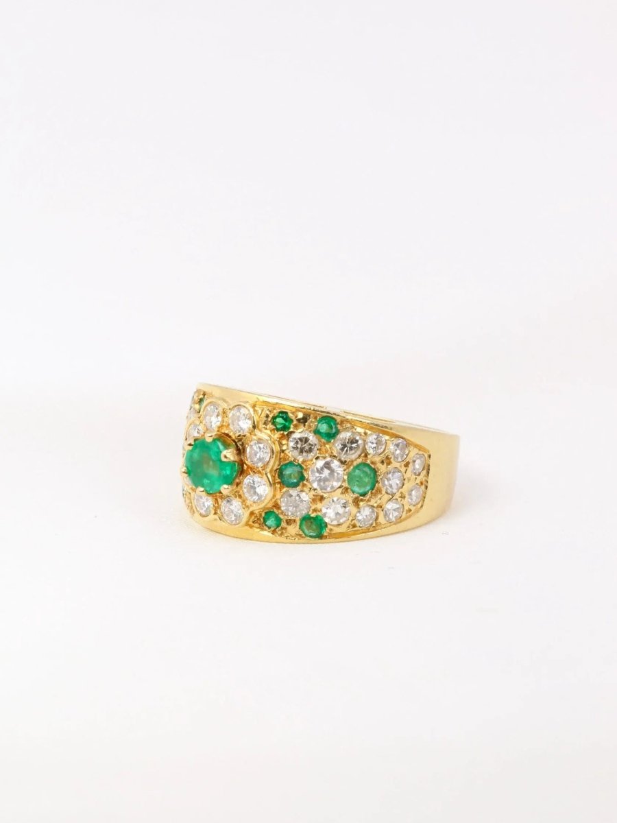 Bague bandeau vintage en or jaune, diamants et émeraudes - Castafiore