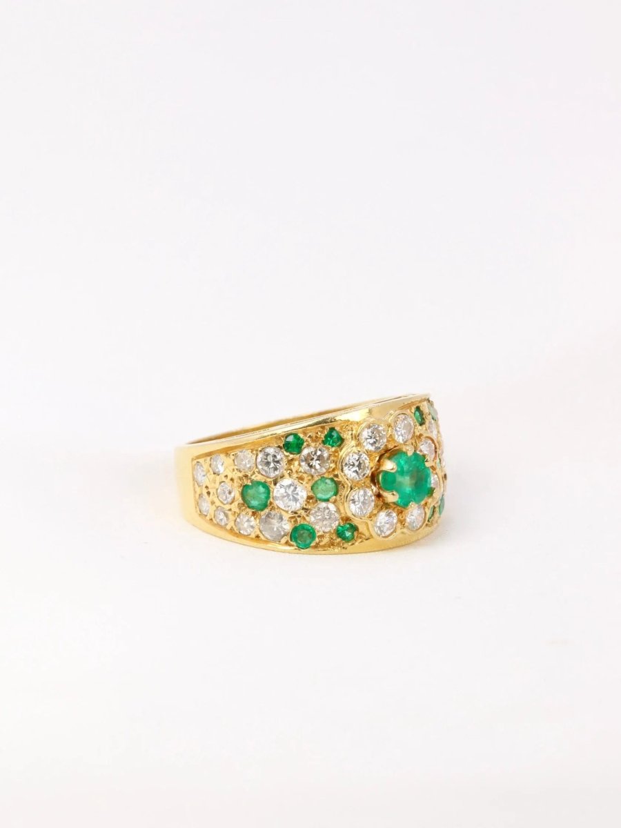 Bague bandeau vintage en or jaune, diamants et émeraudes - Castafiore
