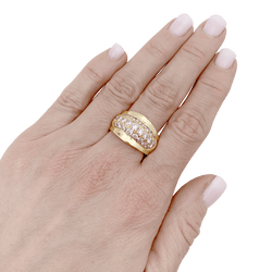 Bague bombée en or jaune et diamants. - Castafiore