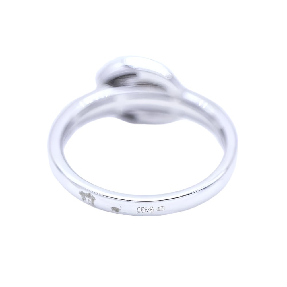 Bague Boucle en or blanc et diamants. - Castafiore