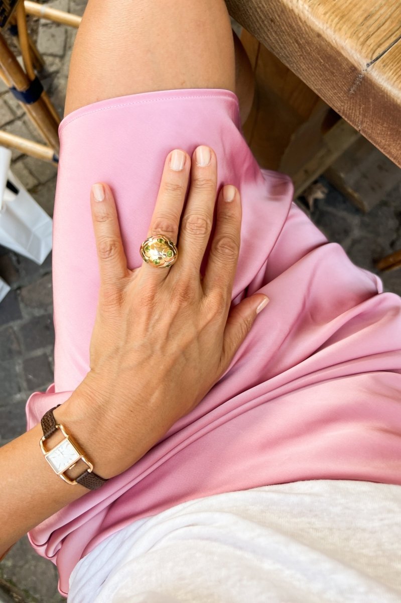 Bague boule BULGARI en péridot en or bi - colore - Castafiore