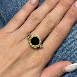 Bague BULGARI Réversible en or jaune nacre et onyx - Castafiore