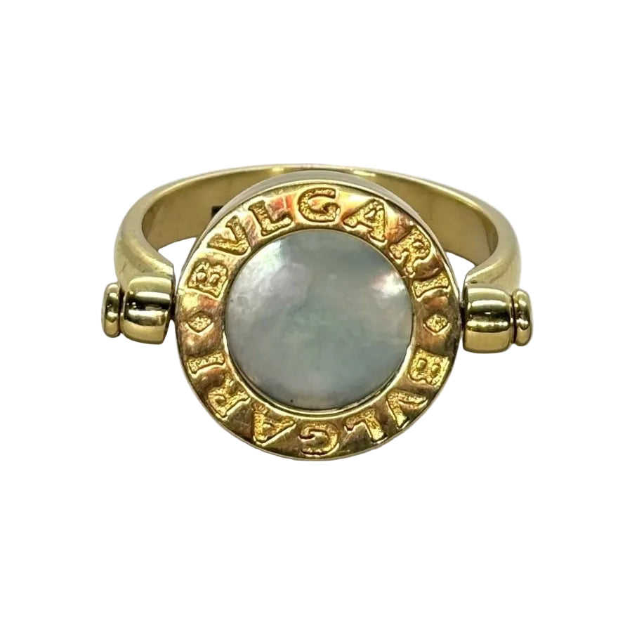 Bague BULGARI Réversible en or jaune nacre et onyx - Castafiore