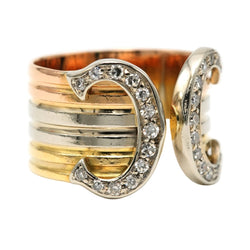 Bague CARTIER "Double C" en or blanc, or jaune, or rose et diamants - Castafiore