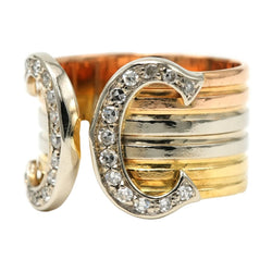 Bague CARTIER "Double C" en or blanc, or jaune, or rose et diamants - Castafiore