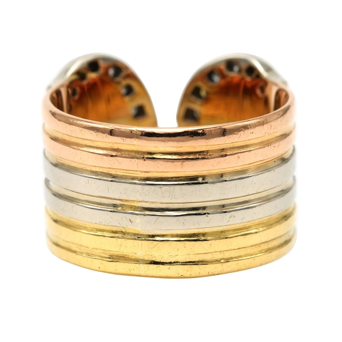 Bague CARTIER "Double C" en or blanc, or jaune, or rose et diamants - Castafiore
