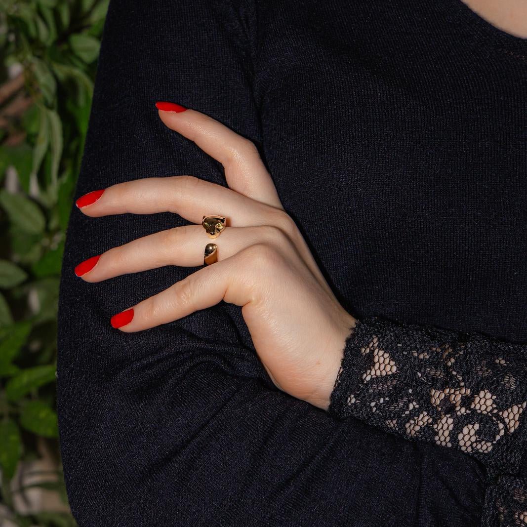 Bague CARTIER "Panthère" en or jaune, tsavorites et onyx - Castafiore