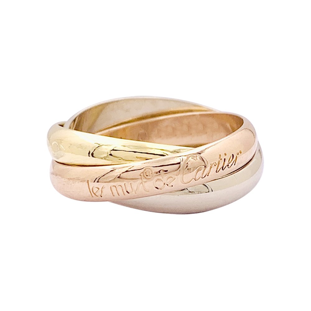 Bague Cartier "Trinity" trois ors. - Castafiore