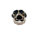 Bague CHANEL Camélia en or blanc et onyx - Castafiore