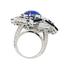 Bague CHAUMET "Le Grand Frisson" en or blanc, opale de feux, diamants et onyx - Castafiore