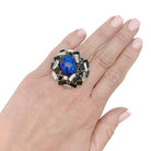 Bague CHAUMET "Le Grand Frisson" en or blanc, opale de feux, diamants et onyx - Castafiore