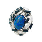 Bague CHAUMET "Le Grand Frisson" en or blanc, opale de feux, diamants et onyx - Castafiore