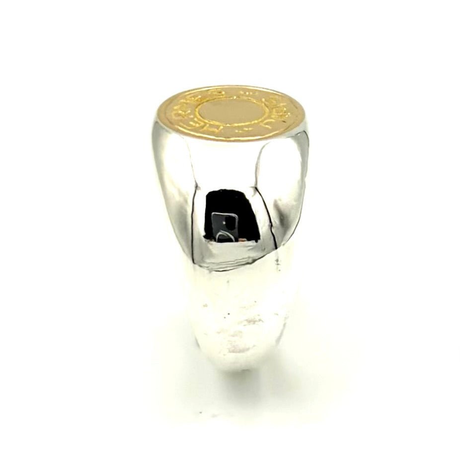 Bague Chevalière HERMÈS "Clou de Selle" en or jaune et argent - Castafiore